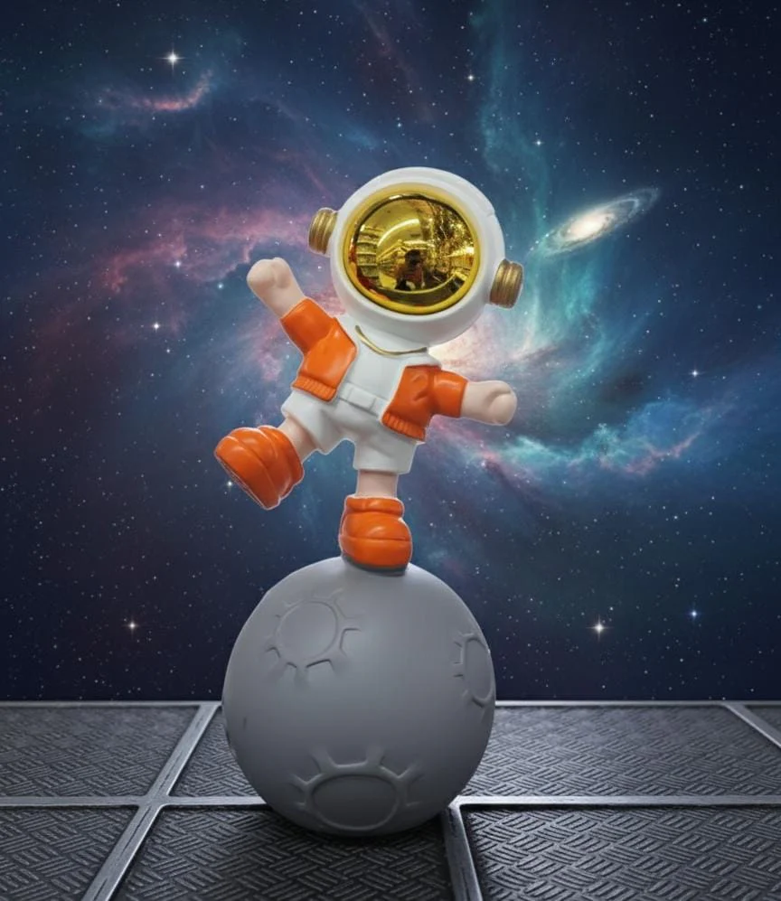AKDC 24cm Ceramic Astronaut Balancing on Moon Décor in Orange and White | Unique Space Art Sculpture for Home